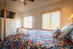 Queen Bed with TV in Guest Bedroom 1
